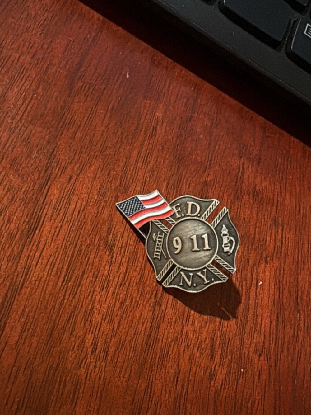 FDNY Antiqued metal Maltese-cross lapel pin